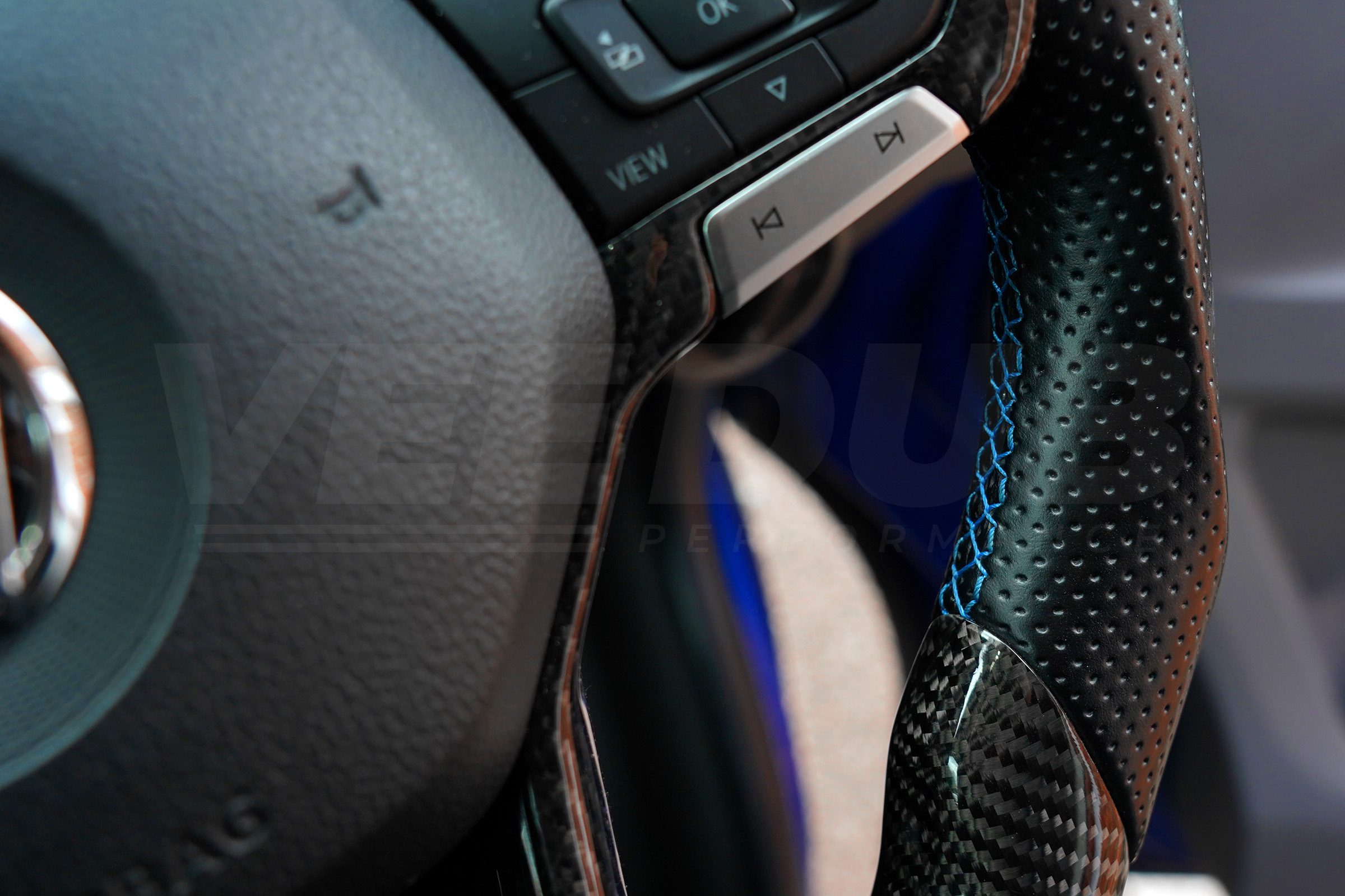 T6.1 Vee Dub Performance Carbon Fibre & Punched Leather Flat Bottom Steering Wheel (Blue Stitch) - Image 4
